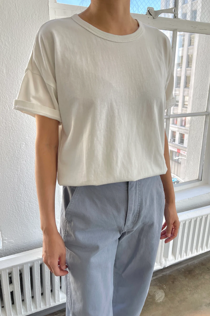 Her Tee