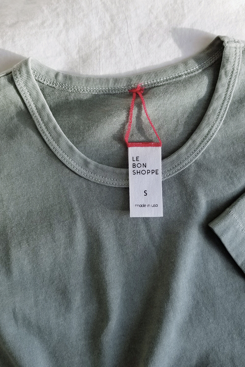 Her Tee