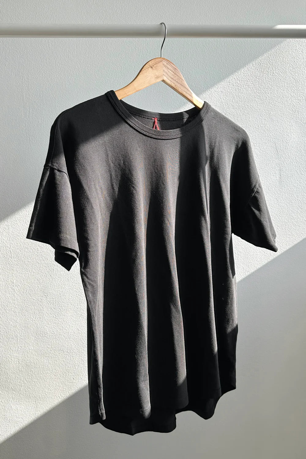 Her Tee